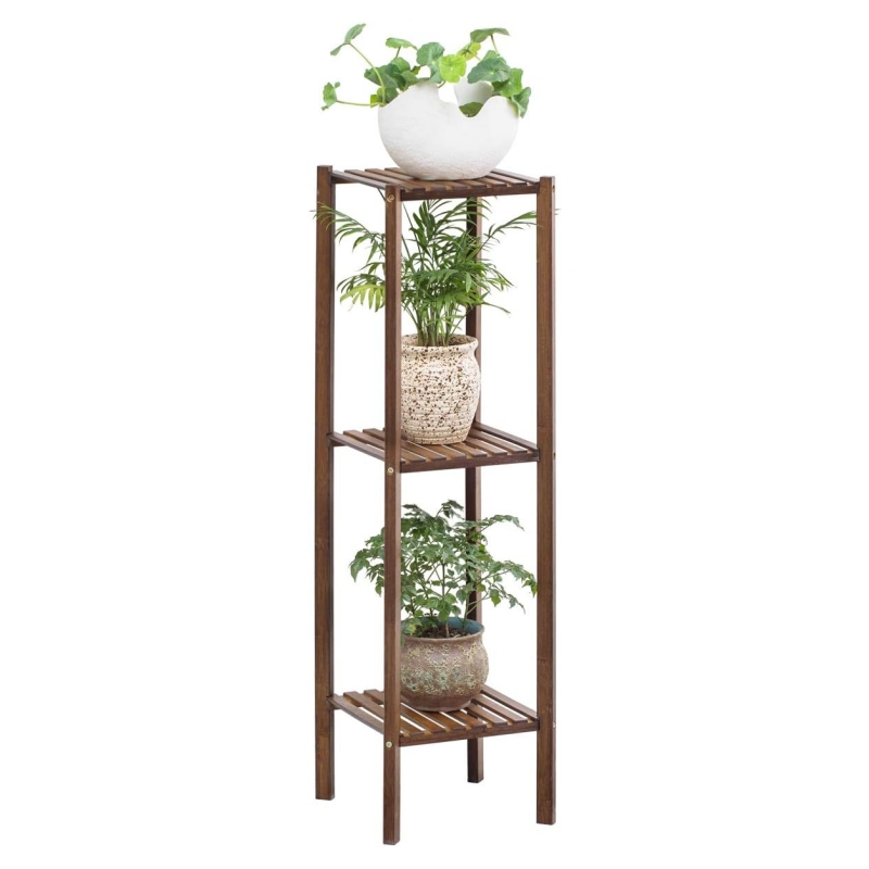 How can wooden flower stands be perfectly integrated into different indoor spaces