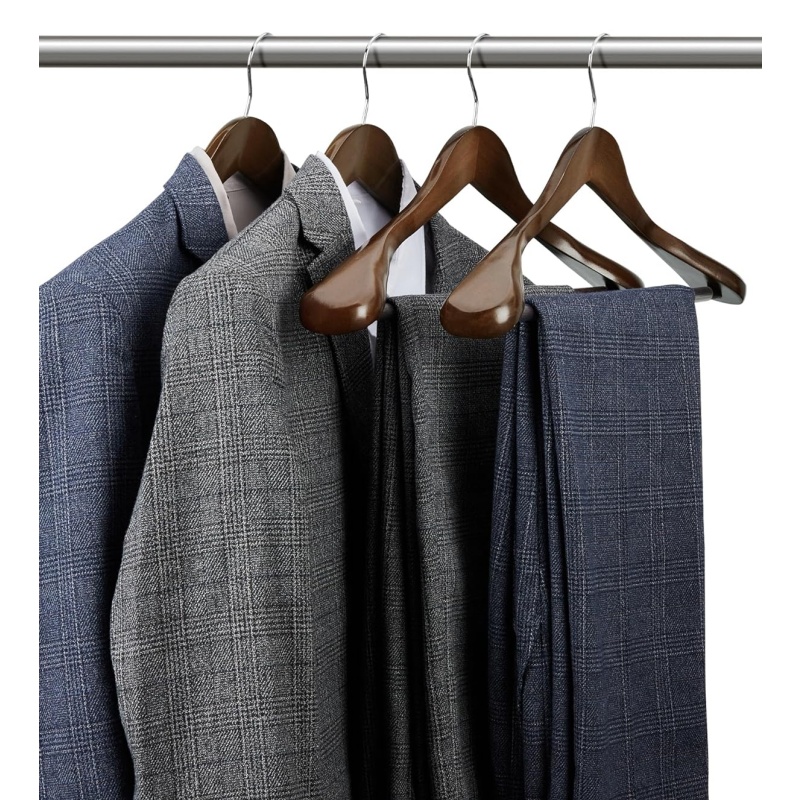 Using wooden clothes hangers represents an upgrade in style from storage to display