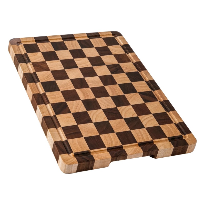 The wooden cutting board turns chopping vegetables in the kitchen into a small ritual